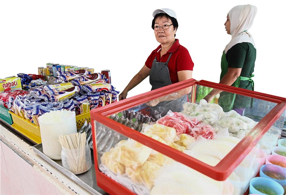 School canteens are no longer allowed to sell cream buns and other junk food. — Filepic