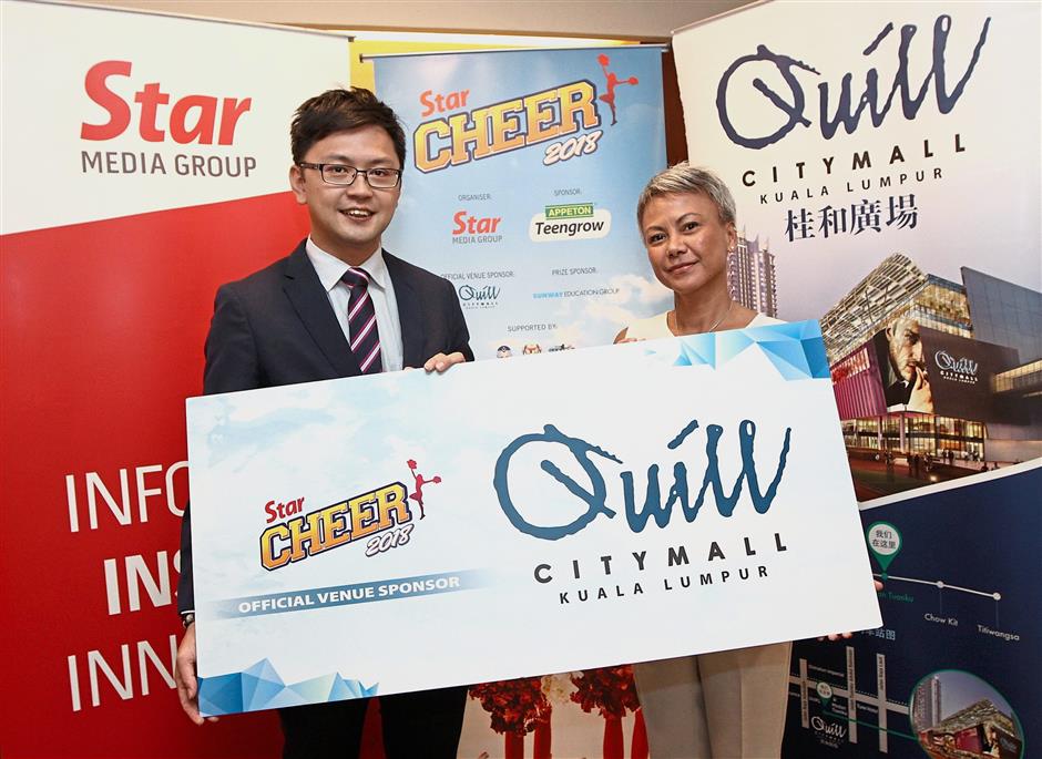 Teo (left) with Star Media Group Bhd advertising and business development manager Mardzlina Ismail.