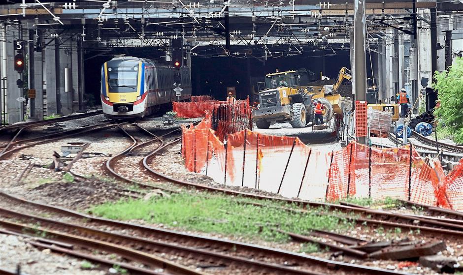 A Komuter train leaving the Bank Negara station, heading towards Rawang. The track upgrading works are part of the Infrastructure and System Upgrading Project of Klang Valley Double Track, which is scheduled to be completed in November 2019.