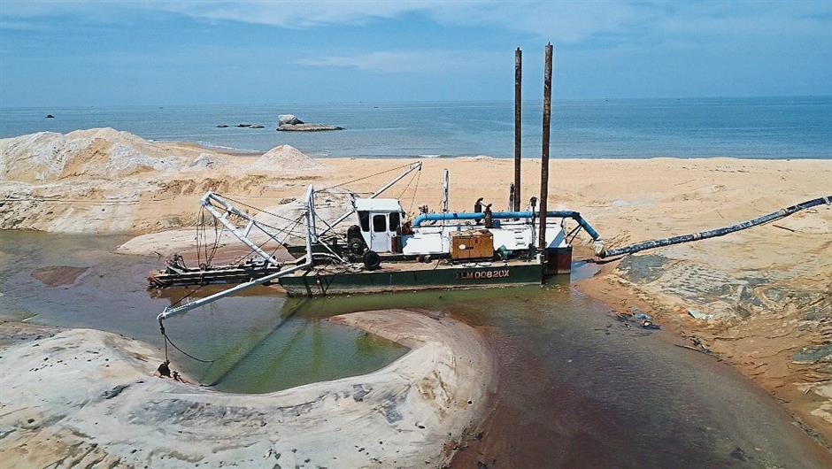 A sand dredge in operation at Pasir Panjang, Segari, Manjung. Environmentalists believe the activity is damaging the delicate ecosystem of one of the few major turtle landing sites in the state.