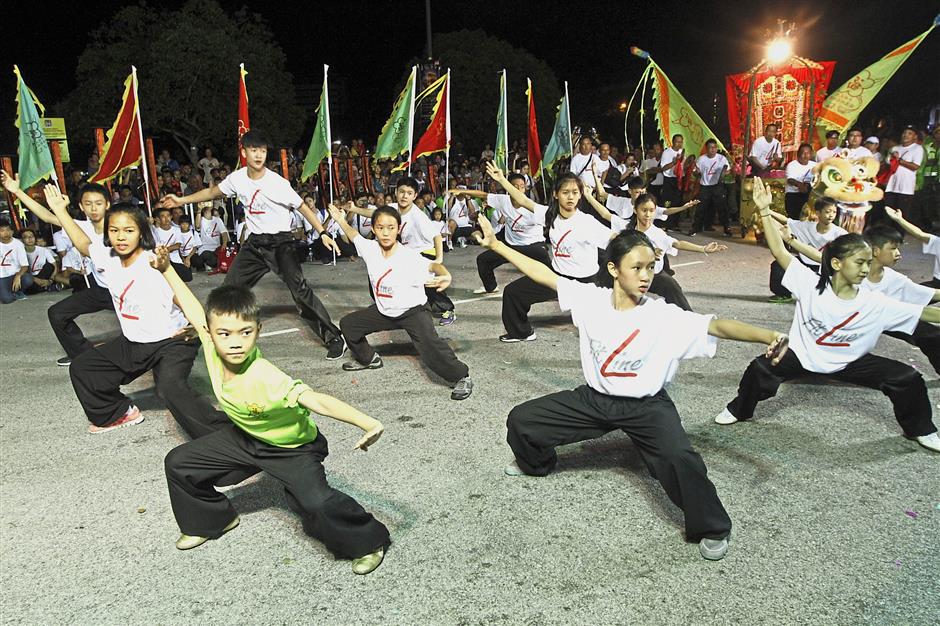 Wushu exponents giving a demonstration during the event.