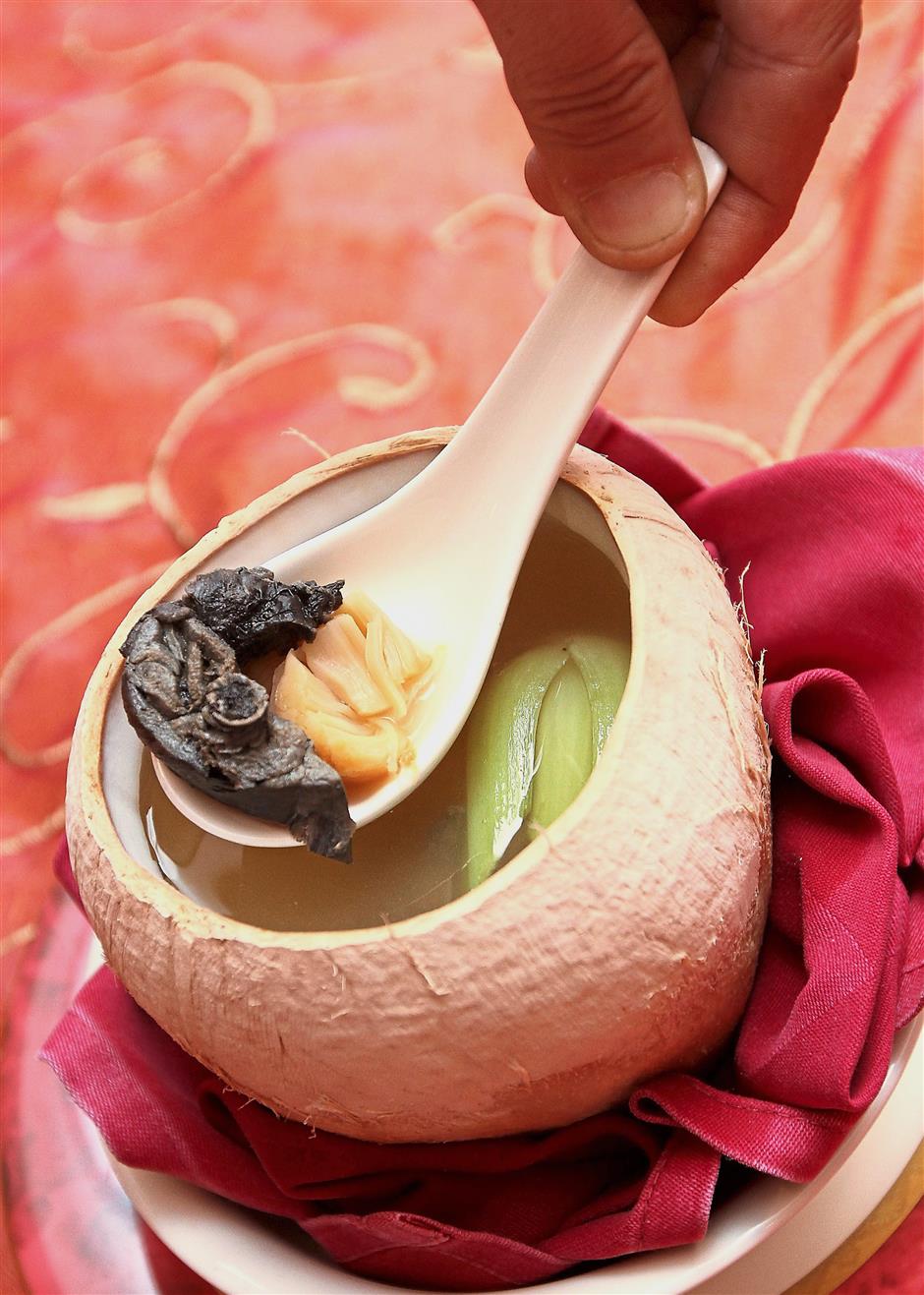 Teh’s specialty, the Double-boiled Chicken Soup with Vegetable in Coconut.