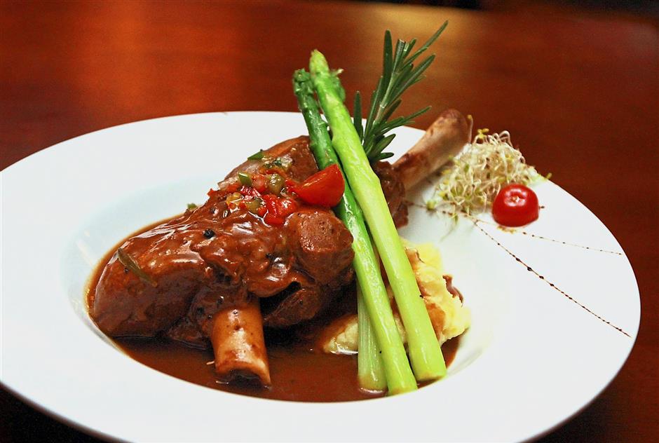 Braised Lamb Shank with Moroccan spices served with garlic mash and grilled asparagus.