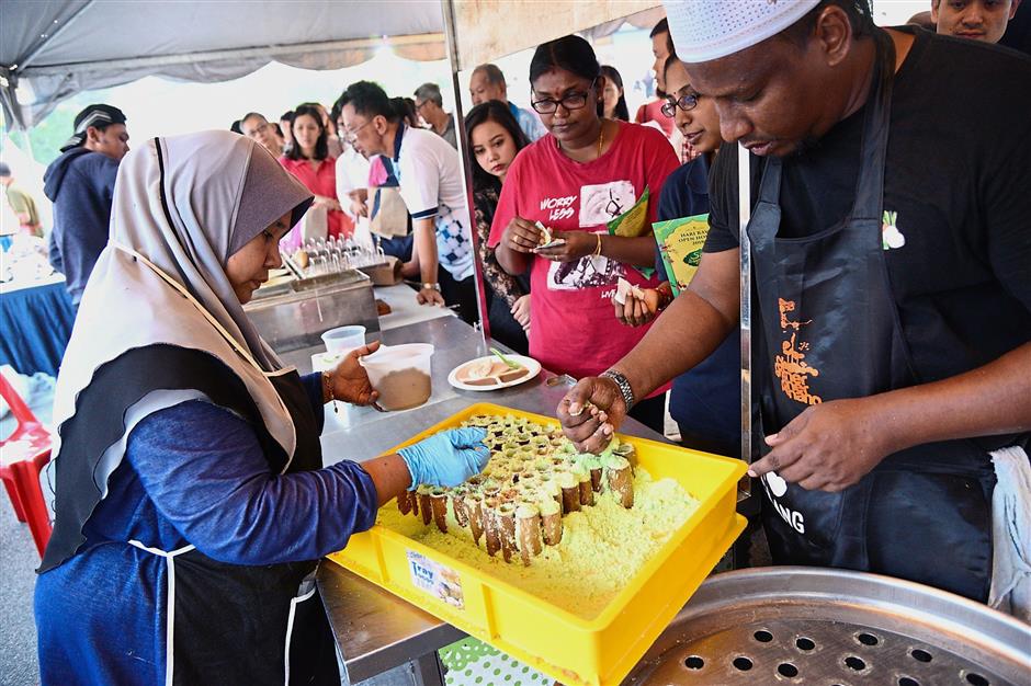 Visitors treated to a variety of festive delights at the Raya open house.