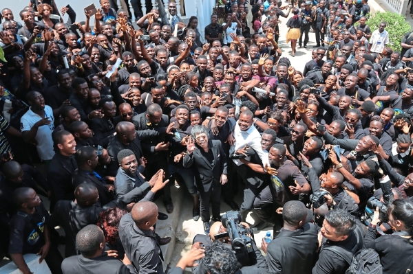 Lim (middle) received a rapturous welcome at Limkokwing University Sierra Leone on his arrival. — File pic