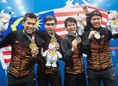 Malaysia men squash team celebrate after beat Hong Kong in the mens team final match during Asian Games 2018 in Squash Stadium Gelora Bung Karno, Jakarta, Indonesia. FAIHAN GHANI/The Star.