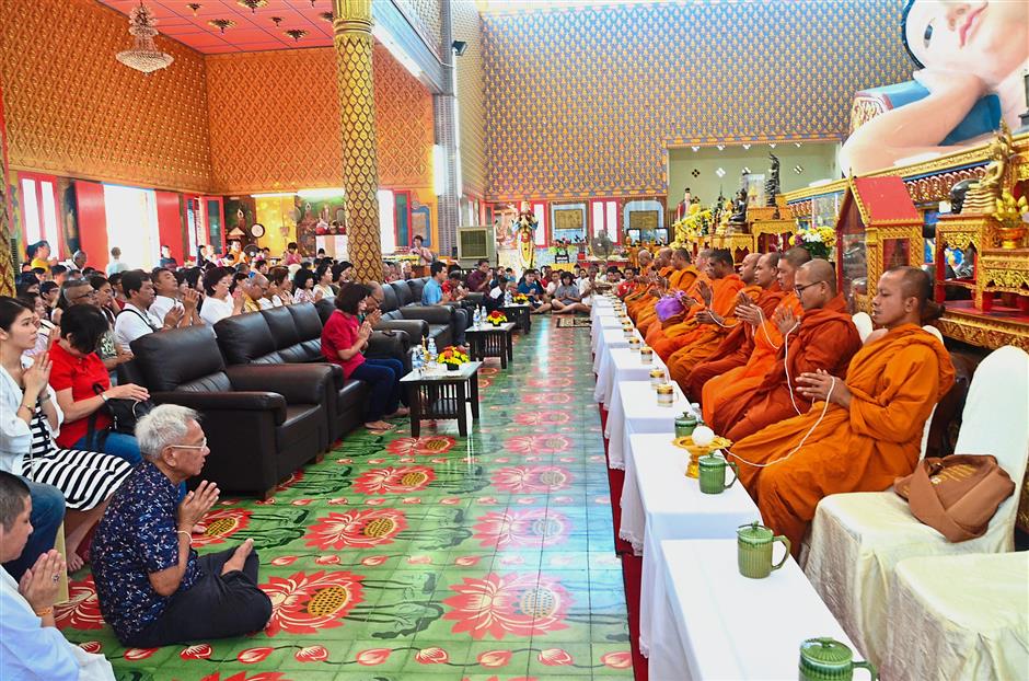 Devotees welcome new year by making offerings to monks | The Star Online