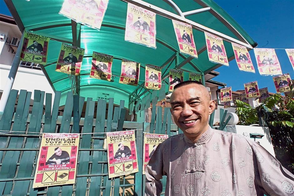 Lim with his election banners when he contested in Bukit Bintang constituency.
