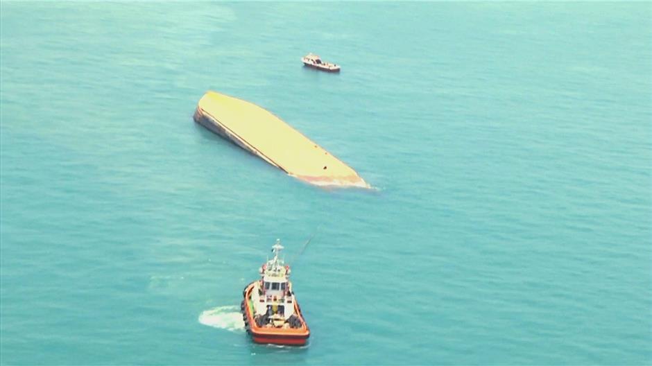 Ill-fated vessel: A screenshot from China Central Television’s video showing the capsized ‘JBB Rong Chang 8’ vessel off Tanjung Tohor in Johor.