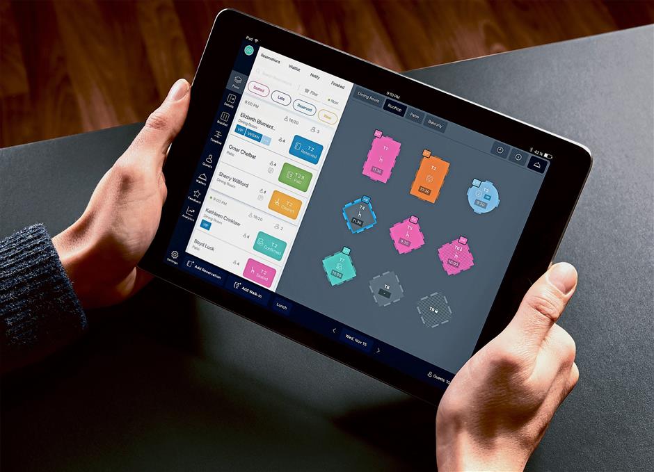 A sample of the table management software by Umai, available on mobile devices and desktop. — Photos: Umai