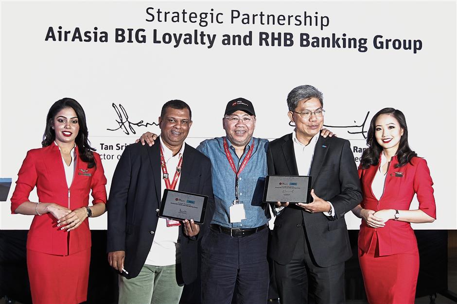 Rhb Banking Group And Airasia Tie Up In Loyalty Programme The Star