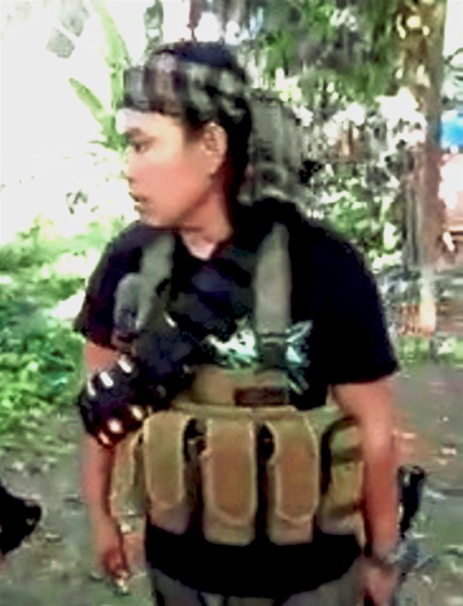 Conspicuous disguise: Indang is said to be sporting blond hair now.