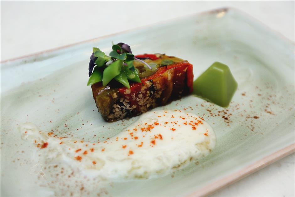 Terrine of roasted pepper with beans and peas jelly.