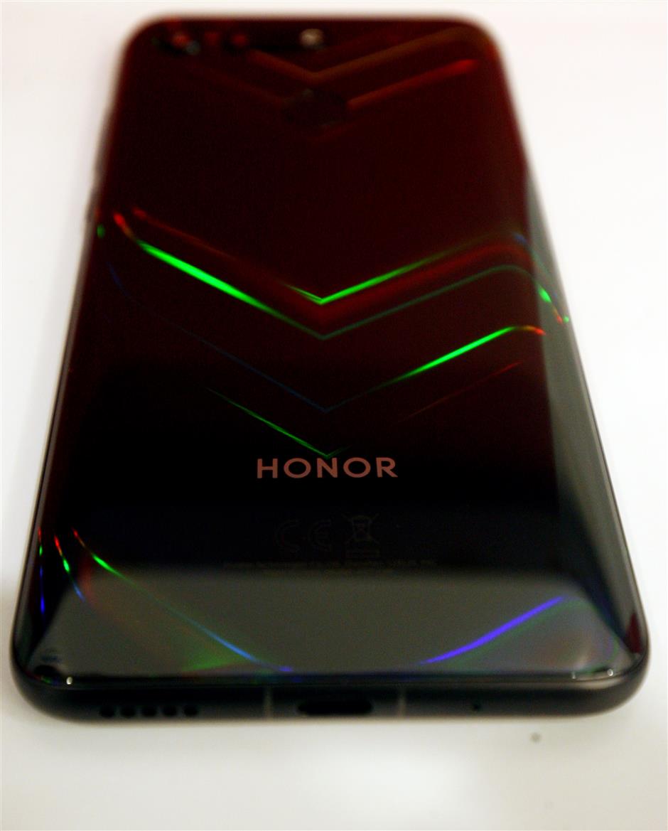 Honor has its vivid chevron patterns on the back of View 20 which “move” in various colours at different angles. — FAIHAN GHANI/The Star