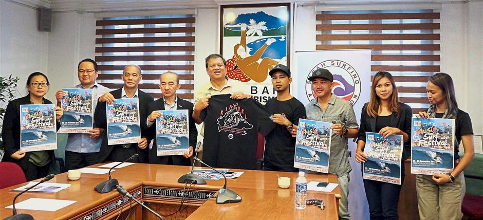 (From left) STB Research and Support Services deputy general manager Noredah Othman, Sri Pelancongan Sabah general manager Zachary Mobijohn, STB Finance and Corporate Services deputy general manager Kevin Chin, STB general manager Gordon Yapp, Joniston, Rip Curl Malaysia area manager Yunus Yaakob, Sabah Surfing Association president Ivan Nicholas, Sabah Surfing Association treasurer Shafina Adly and festival emcee Amy Dangin.