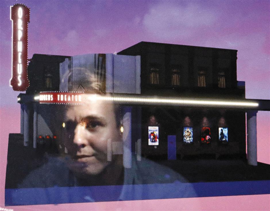 Kyle Barton, shown reflected in a computer screen, designed this image of a theater in the software Charisma, a virtual reality program being tested by UTD's Center for Brain Health to help people on the autism spectrum. Barton, who is on the autism spectrum, is a graduate and instructor at the nonPareil Institute in Plano, Texas. (Ron Baselice/Dallas morning News/TNS)