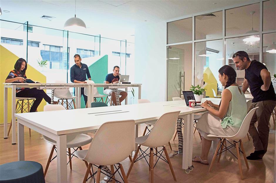 Trehaus co-working space uses bright, and chic interior design for the members working section.