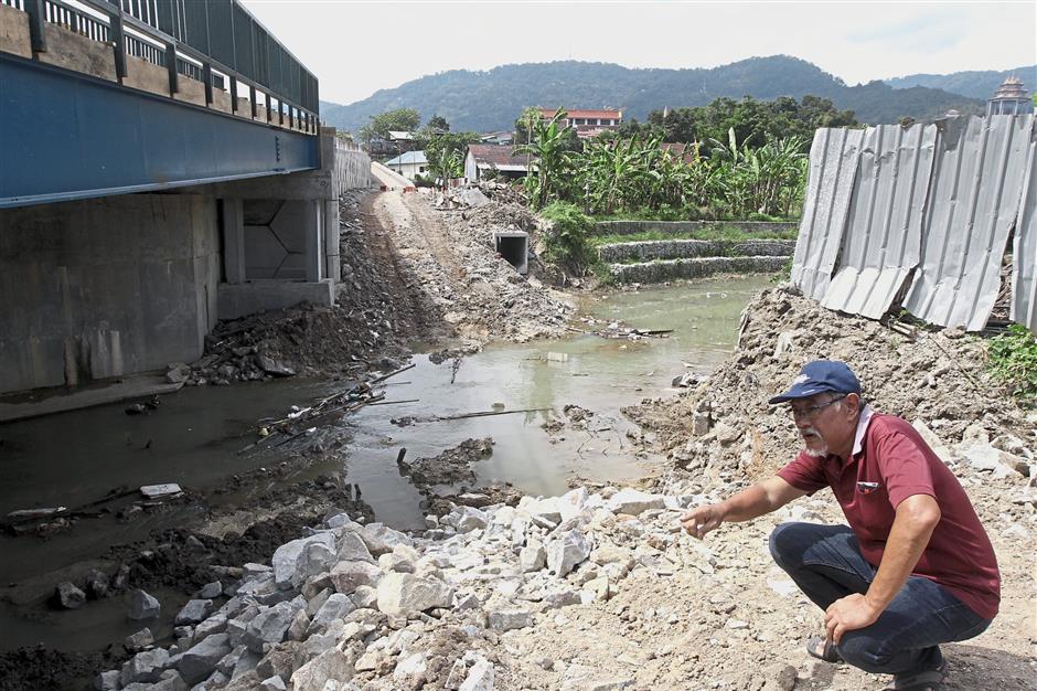 Air Itam residents say debris from bridge led to flooding The Star