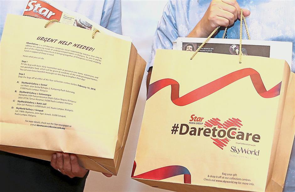 The paper bags can be filled with gifts or donations of essential items such as personal care goods, stationery and non-perishable food products.