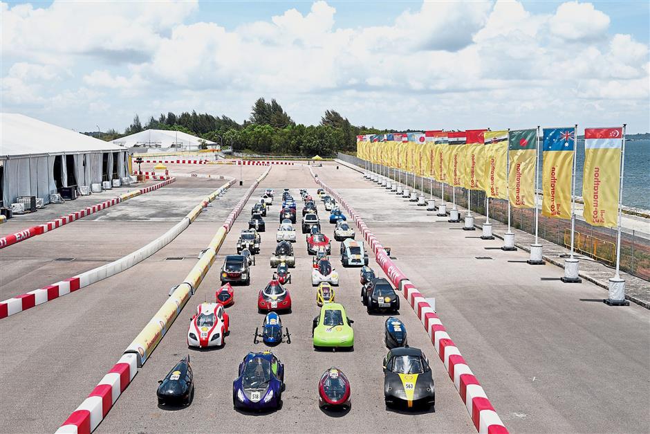 The specially designed vehicles on the track during the second day of the Shell Eco-Marathon Asia in Singapore. — Photos by STEVEN DANIEL/The Star and courtesy of Shell