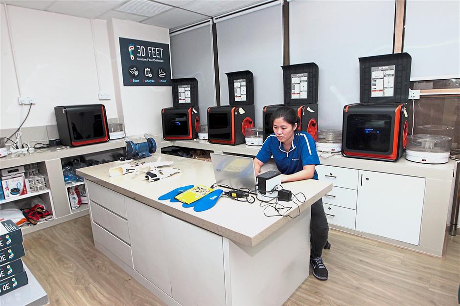 NLB Consulting’s lab features a range of printers that are environmentally controlled to ensure the printed items don’t become distorted. — Art Chen/The Star
