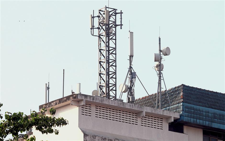 Telecommunication towers erected on top of a building in Ipoh.
