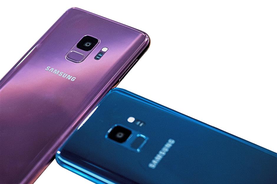 Both smartphones are available in three colours, namely Midnight Black, Coral Blue and the new Lilac Purple except for the spacious Galaxy S9 256GB which comes only in Midnight Black. — Bloomberg