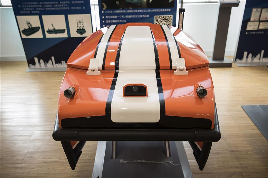 An Oceanalpha Co. ME70 autonomous hydrographic survey unmanned surface vessel stands on display at the company's facility in Zhuhai, China, on Thursday, May 18, 2018. Oceanalpha, one of a handful of companies around the globe specializing in ocean-going drones that operate on the surface, has fired the interest of some of China's biggest venture capitalists. Photographer: Qilai Shen/Bloomberg