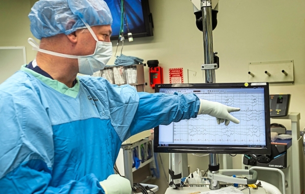 Dr Ojemann points to abnormal brainwave patterns detected after he placed electrodes on the surface of Williams’ brain to pinpoint the region causing epileptic seizures.