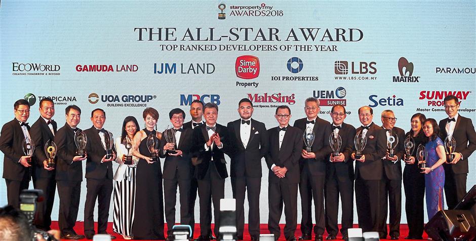 Winners all: Top Ranked Developers of the Year Award with Raja Muda Selangor Tengku Amir Shah Sultan Sharafuddin Idris Shah at the StarProperty.my Awards Night 2018. Celebrating with the recipients are <a href='/business/marketwatch/stocks/?qcounter=STAR' target='_blank'>Star Media Group Bhd</a><a href='http://charts.thestar.com.my/?s=STAR' target='_blank'><img class='go-chart' src='https://cdn.thestar.com.my/Themes/img/chart.png' /></a> chairman Datuk Fu Ah Kiow (on Tengku Amir’s left) and Wong (on Tengku Amir’s right). The winners are (from left) <a href='/business/marketwatch/stocks/?qcounter=TROP' target='_blank'>Tropicana Corp Bhd</a><a href='http://charts.thestar.com.my/?s=TROP' target='_blank'><img class='go-chart' src='https://cdn.thestar.com.my/Themes/img/chart.png' /></a> group MD Datuk Andy Khoo, <a href='/business/marketwatch/stocks/?qcounter=ECOWLD' target='_blank'>Eco World Development Group Bhd</a><a href='http://charts.thestar.com.my/?s=ECOWLD' target='_blank'><img class='go-chart' src='https://cdn.thestar.com.my/Themes/img/chart.png' /></a> president and CEO Datuk Chang Khim Wah, Gamuda Land CEO Ngan Chee Meng, IJM Land Bhd central region senior GM Datuk Hoo Kim See, <a href='/business/marketwatch/stocks/?qcounter=IOIPG' target='_blank'>IOI Properties</a><a href='http://charts.thestar.com.my/?s=IOIPG' target='_blank'><img class='go-chart' src='https://cdn.thestar.com.my/Themes/img/chart.png' /></a> Corp Bhd executive director Lee Yoke Har, <a href='/business/marketwatch/stocks/?qcounter=LBS' target='_blank'>LBS Bina Group Bhd</a><a href='http://charts.thestar.com.my/?s=LBS' target='_blank'><img class='go-chart' src='https://cdn.thestar.com.my/Themes/img/chart.png' /></a> executive director Datuk Cynthia Lim, <a href='/business/marketwatch/stocks/?qcounter=MAHSING' target='_blank'>Mah Sing Group Bhd</a><a href='http://charts.thestar.com.my/?s=MAHSING' target='_blank'><img class='go-chart' src='https://cdn.thestar.com.my/Themes/img/chart.png' /></a> CEO Datuk Ho Hon Sang, Malaysian Resources Corp Bhd executive director Imran Salim, Matrix Concepts Group group deputy MD Ho Kong Soon, <a href='/business/marketwatch/stocks/?qcounter=PARAMON' target='_blank'>Paramount Corp Bhd</a><a href='http://charts.thestar.com.my/?s=PARAMON' target='_blank'><img class='go-chart' src='https://cdn.thestar.com.my/Themes/img/chart.png' /></a> property division Beh Chun Chong, <a href='/business/marketwatch/stocks/?qcounter=SPSETIA' target='_blank'>SP Setia Bhd</a><a href='http://charts.thestar.com.my/?s=SPSETIA' target='_blank'><img class='go-chart' src='https://cdn.thestar.com.my/Themes/img/chart.png' /></a> president and CEO Datuk Khor Chap Jen, <a href='/business/marketwatch/stocks/?qcounter=SIMEPROP' target='_blank'>Sime Darby Property Bhd</a><a href='http://charts.thestar.com.my/?s=SIMEPROP' target='_blank'><img class='go-chart' src='https://cdn.thestar.com.my/Themes/img/chart.png' /></a> Datuk Wan Hashimi, <a href='/business/marketwatch/stocks/?qcounter=SUNWAY' target='_blank'>Sunway Bhd</a><a href='http://charts.thestar.com.my/?s=SUNWAY' target='_blank'><img class='go-chart' src='https://cdn.thestar.com.my/Themes/img/chart.png' /></a> property division MD Sarena Cheah, <a href='/business/marketwatch/stocks/?qcounter=UOADEV' target='_blank'>UOA Development Bhd</a><a href='http://charts.thestar.com.my/?s=UOADEV' target='_blank'><img class='go-chart' src='https://cdn.thestar.com.my/Themes/img/chart.png' /></a>