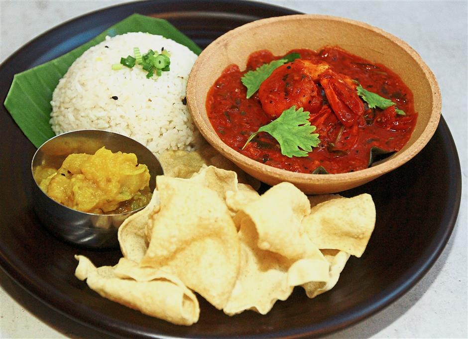 Kerala Prawn Sambal is a spicy dish, though heat levels can be adjusted upon request.