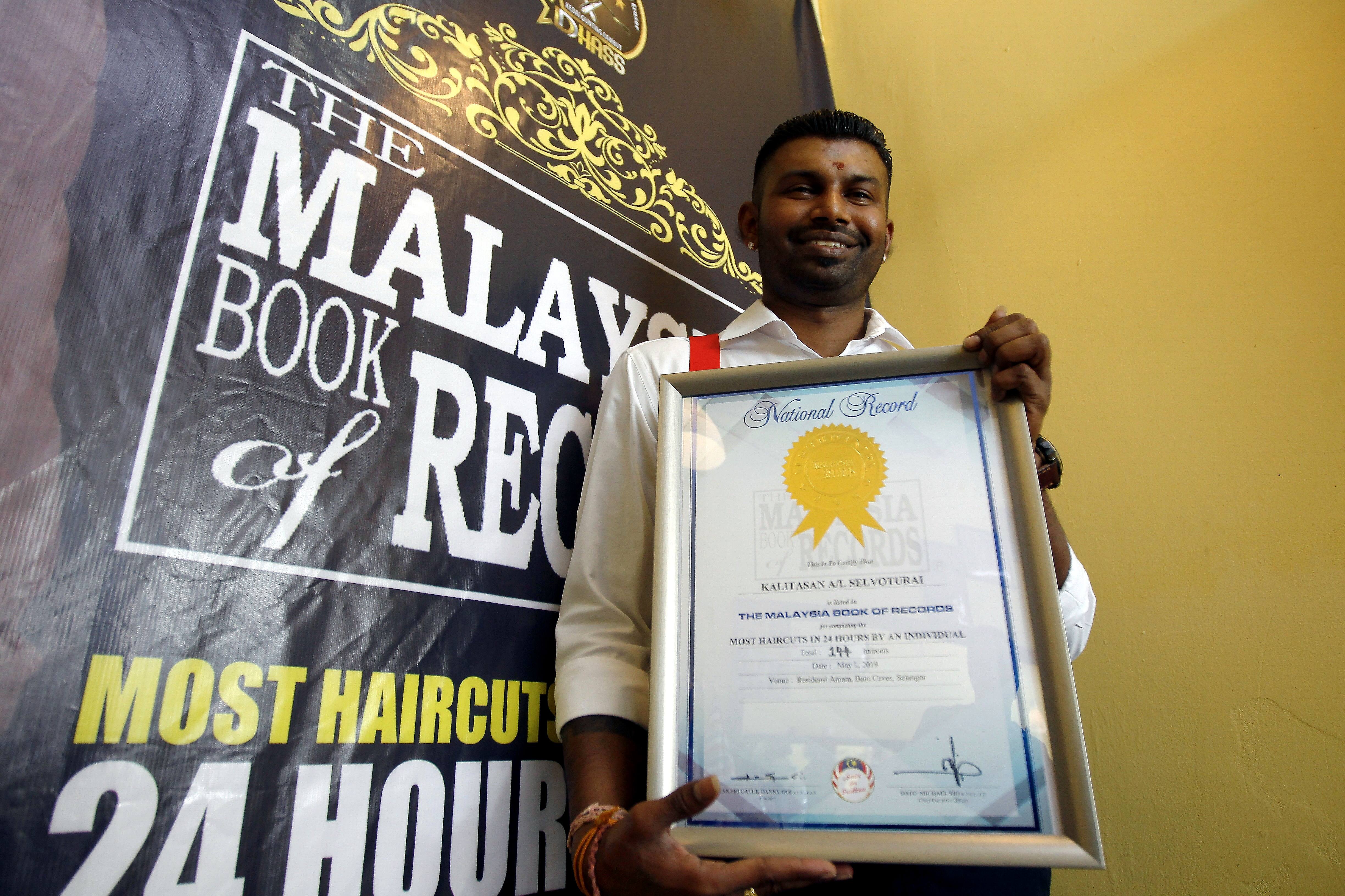 Barber Snips His Way Into Malaysia Book Of Records The Star