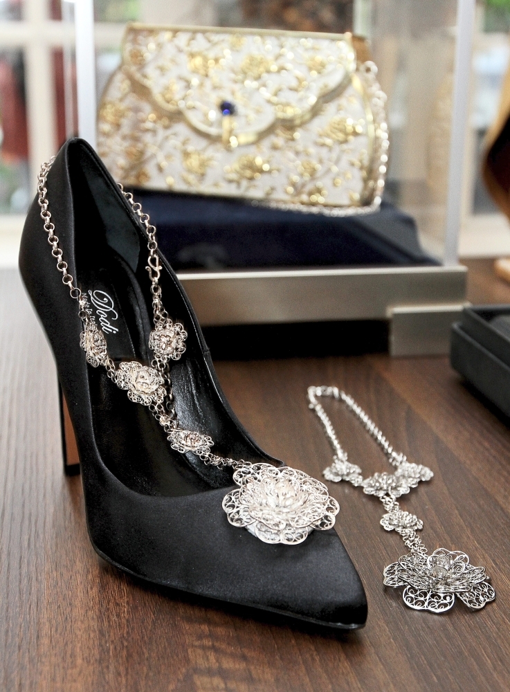 One of Dodi's design of the Italian handmade shoes that has a handmade silver adornment attached on it was made by Suhaimi Mat Jusoh. Photos by YAP CHEE HONG