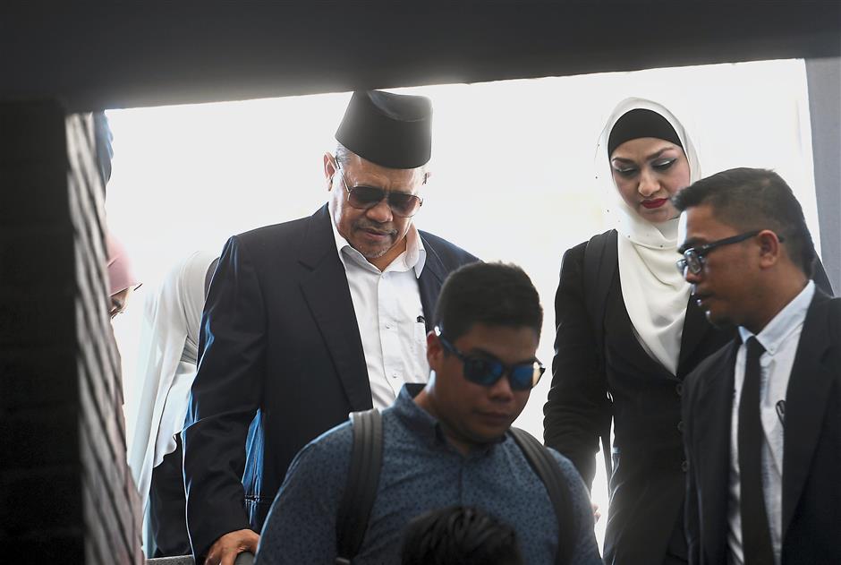 Facing the law: Shahidan arriving at the Sessions Court in Kangar. — Bernama