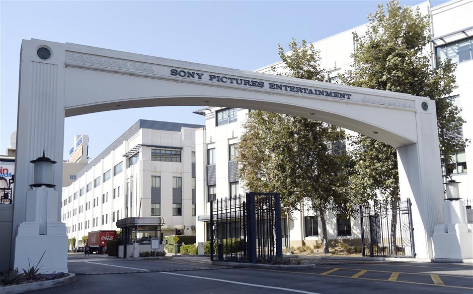FILE - In this Aug. 30, 2016 file photo, the entrance to the Sony Pictures Entertainment lot is seen in Culver City, Calif. A computer programmer working for the North Korean government was charged with devastating cyberattacks that hacked Sony Pictures Entertainment and unleashed the WannaCry ransomware virus that infected computers in 150 countries and crippled parts of the British health care system, federal prosecutors said Thursday, Sept. 6, 2018. (Photo by Chris Pizzello/Invision/AP, File)