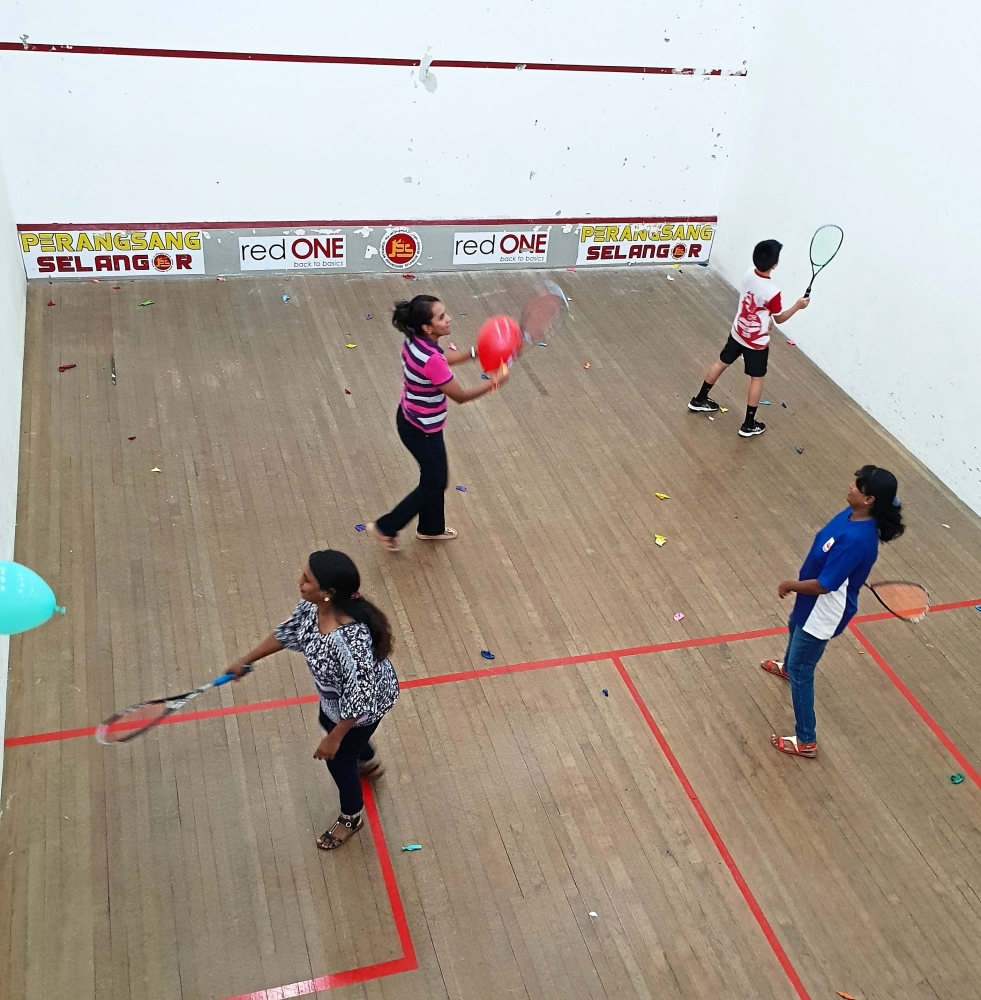 Community Sports Parents and children celebrate World Squash Day The
