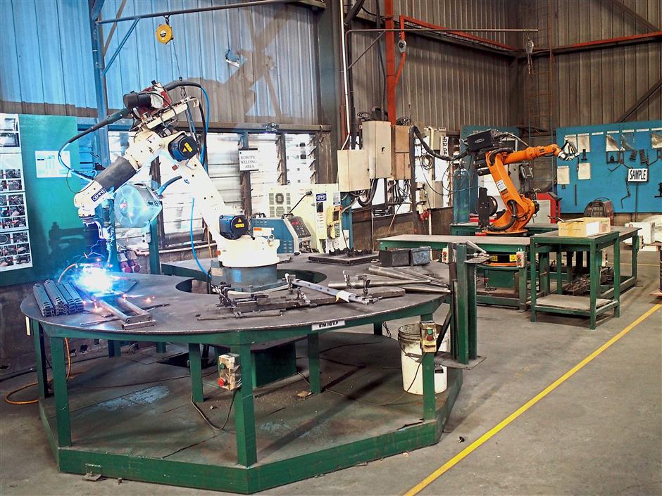 Technology boost: Automation is needed to reduce SMEs reliance on foreign workers.