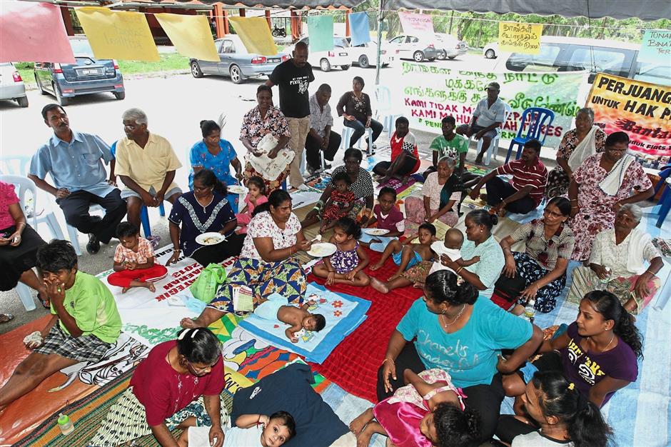 A file photo taken in 2013 showing the Taman Permata flat residents living in a tent after Block 5 was declared unsafe by MPS.