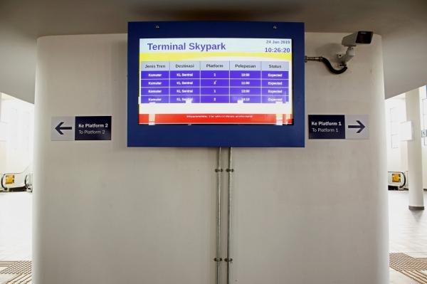The arrival and departure times for the train service should be posted on the digital information board at the airport.
