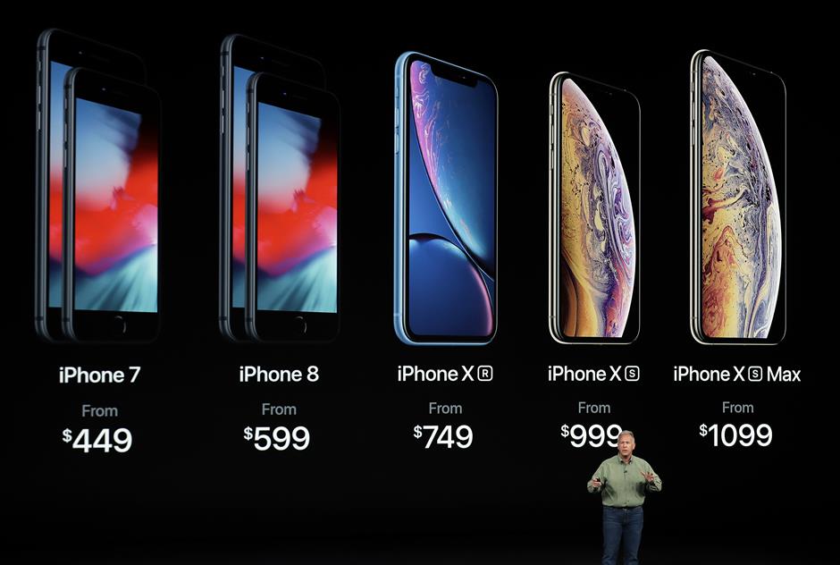 Phil Schiller, Apple's senior vice president of worldwide marketing, speaks about the new Apple iPhone XS, iPhone XS Max and the iPhone XR at the Steve Jobs Theater during an event to announce new Apple products Wednesday, Sept. 12, 2018, in Cupertino, Calif. (AP Photo/Marcio Jose Sanchez)