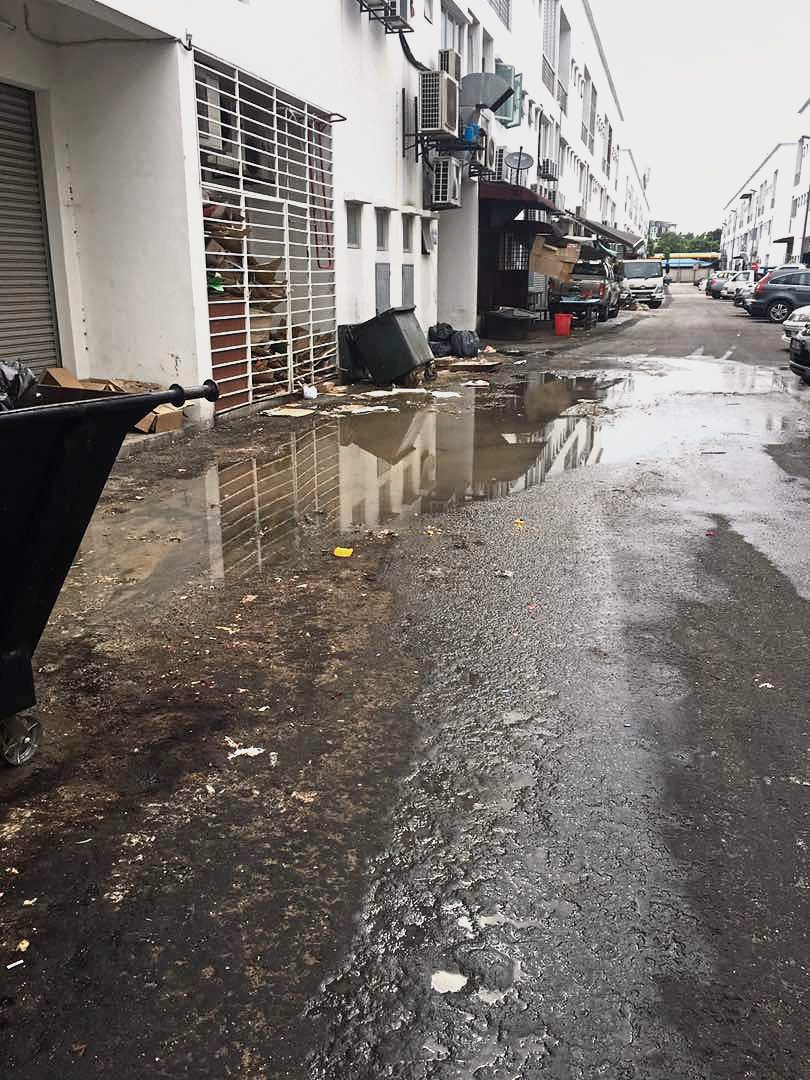 MBSA to manually clean up drains clogged by oil and rubbish dumped by