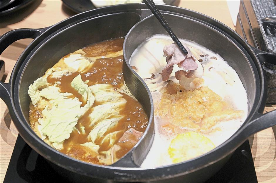 There are four soup selections at Kuro Japanese Restaurant – clear soup, sukiyaki, Japanese curry as well as kuro signature broth. This photo shows the kuro signature broth and curry.