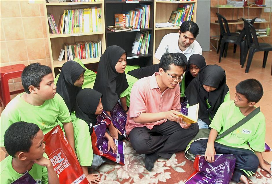 Making learning fun: Nik Nazmi wants to replicate the community library he initiated in his old constituency Seri Setia in his new area Setiawangsa.