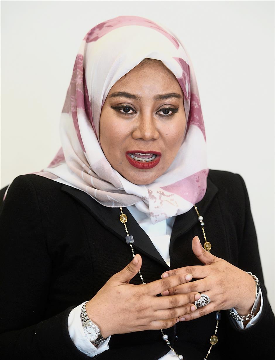 Made her mark: Azihan became a self-made millionaire within two years of becoming a unit trust consultant.