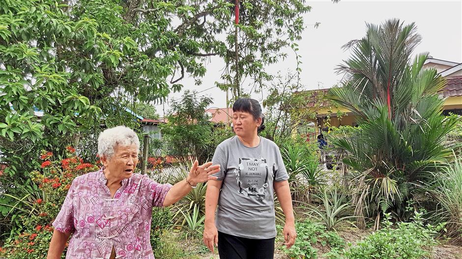 Chung is proud of her vegetable patch and still tends to her plants.