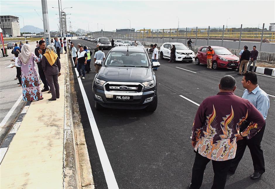 The new Jalan PSPN 2 opening to traffic after the launch near the Penang Science Park in Juru near Bukit Mertajam.