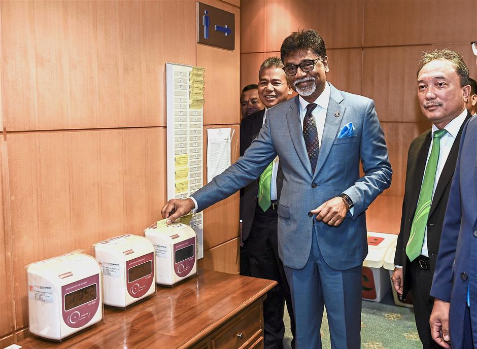 Clocking in: Dr Xavier never expected to become a minister but he is embracing his duties at the Water, Land and Natural Resources Ministry with dedication.