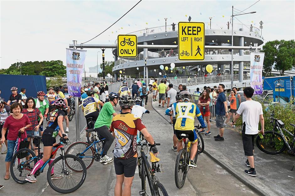 Visitors trying out Jambatan Harapan during the launch.