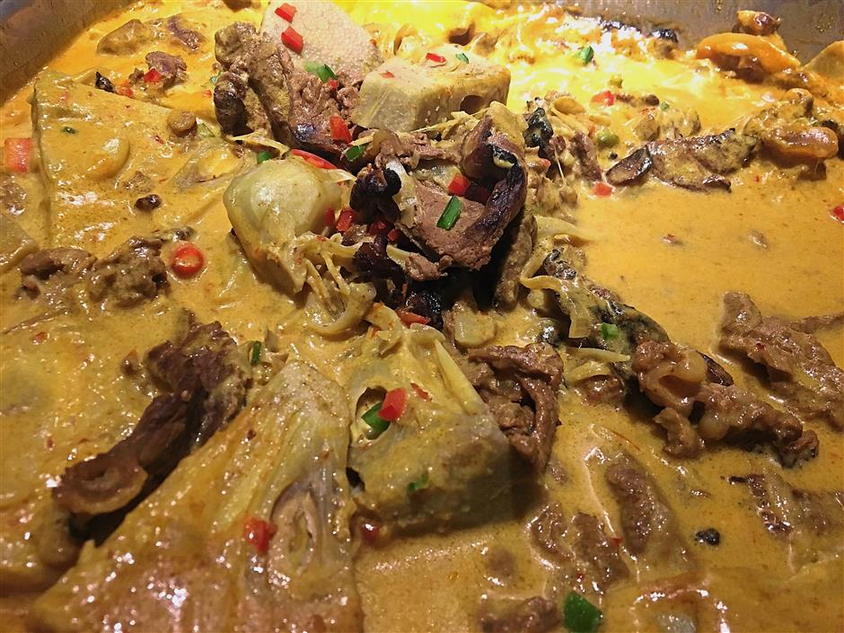(Above) Daging salai with nangka at Weil Hotel Ipoh.