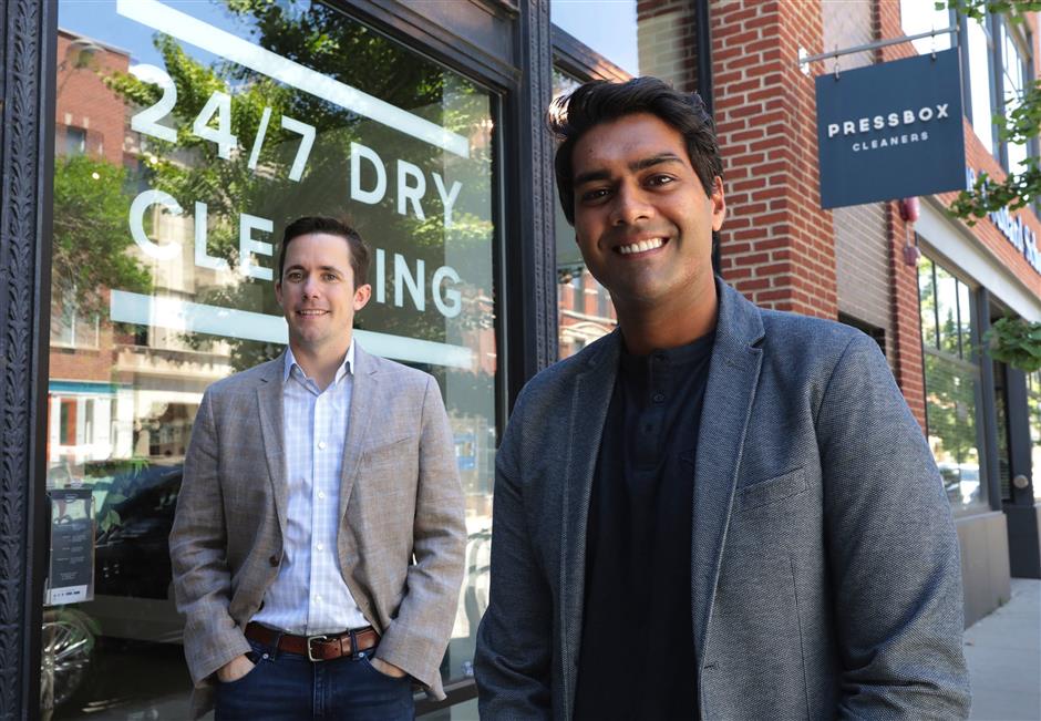 Pressbox founders Drew McKenna, left, and Vijen Patel launched Chicago dry-cleaning startup Pressbox. The company is being acquired by Procter & Gamble, the companies announced Tuesday, July 3, 2018. (Antonio Perez/Chicago Tribune/TNS)